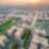 Aerial view of Al Markaziyah West showcasing residential buildings and parks