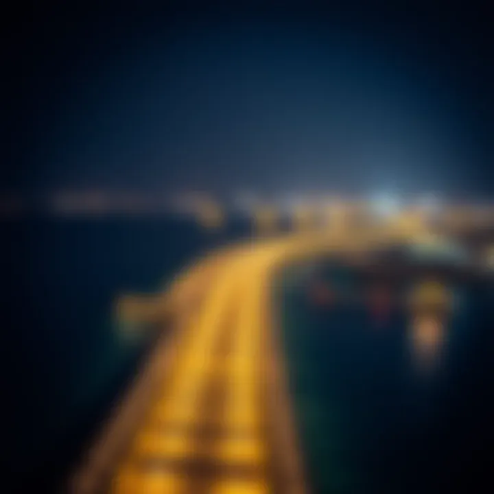 Panoramic night view of the Corniche with city lights